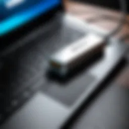 Close-up of a WiFi dongle connected to a laptop